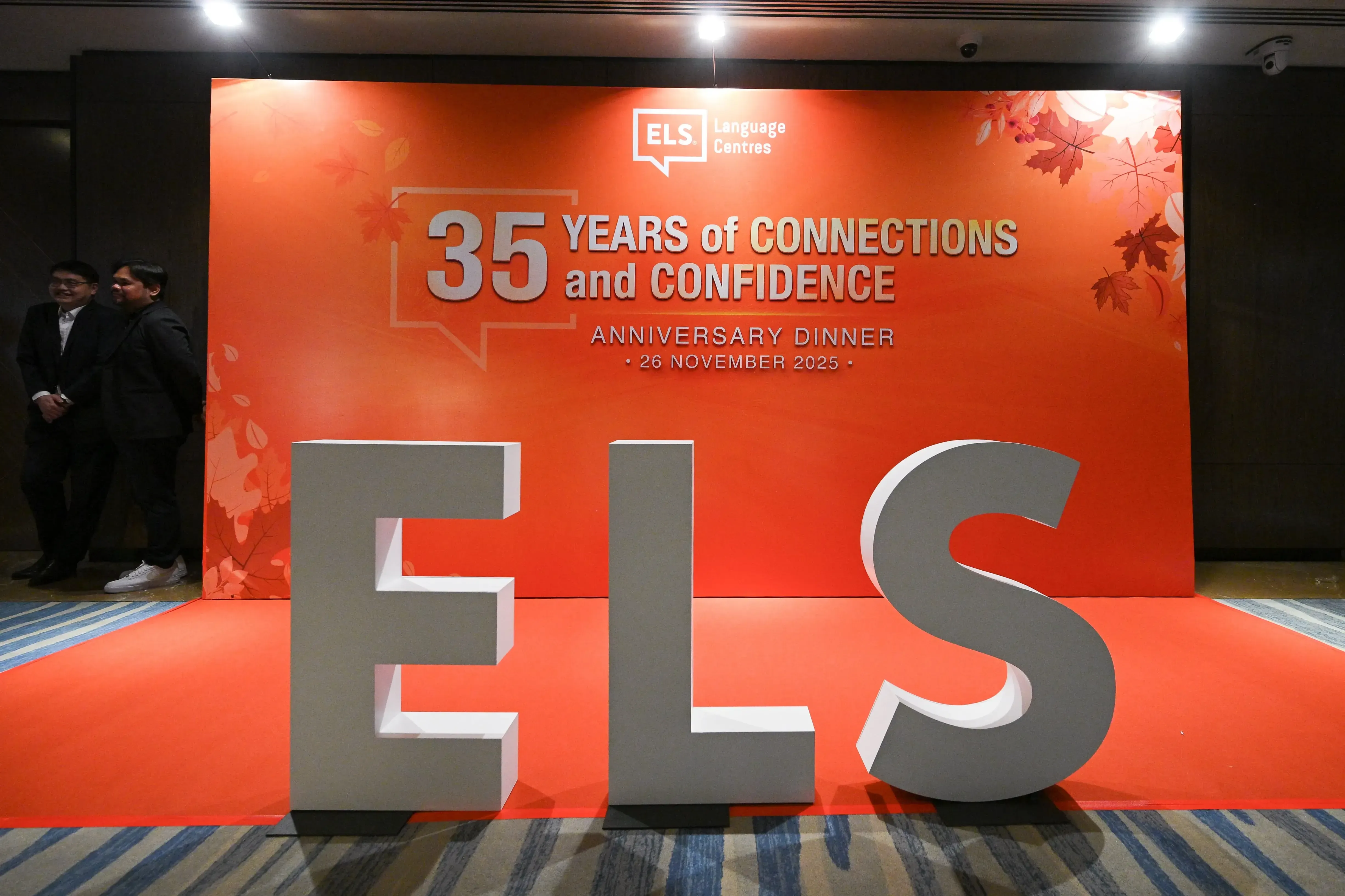 Orange Thanksgiving themed backdrop at the 2025 ELS Annual Dinner celebrating 35 Years of Connections and Confidence
